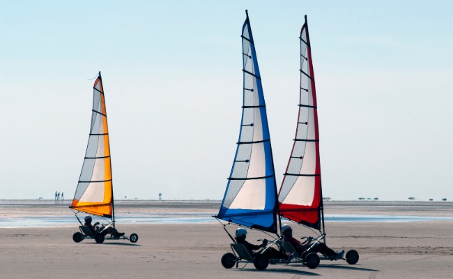 Land buggies on dry riverbed