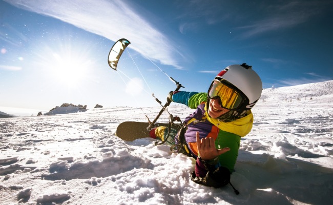 Snowboarder with power kite