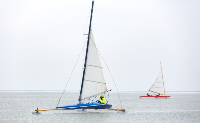 Ice boats on a frozen lake