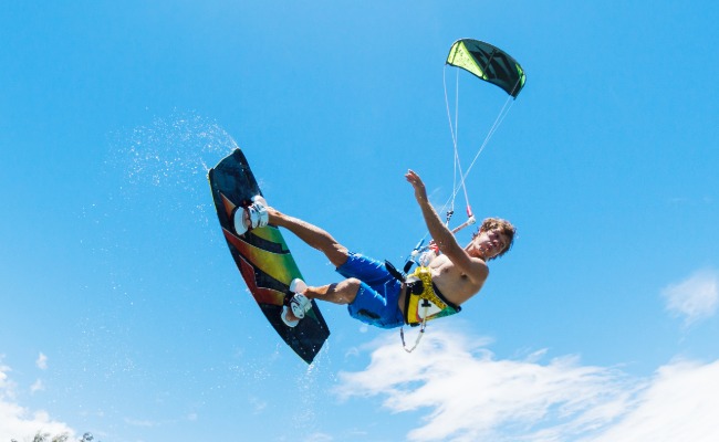 Kite boarder flying through the air